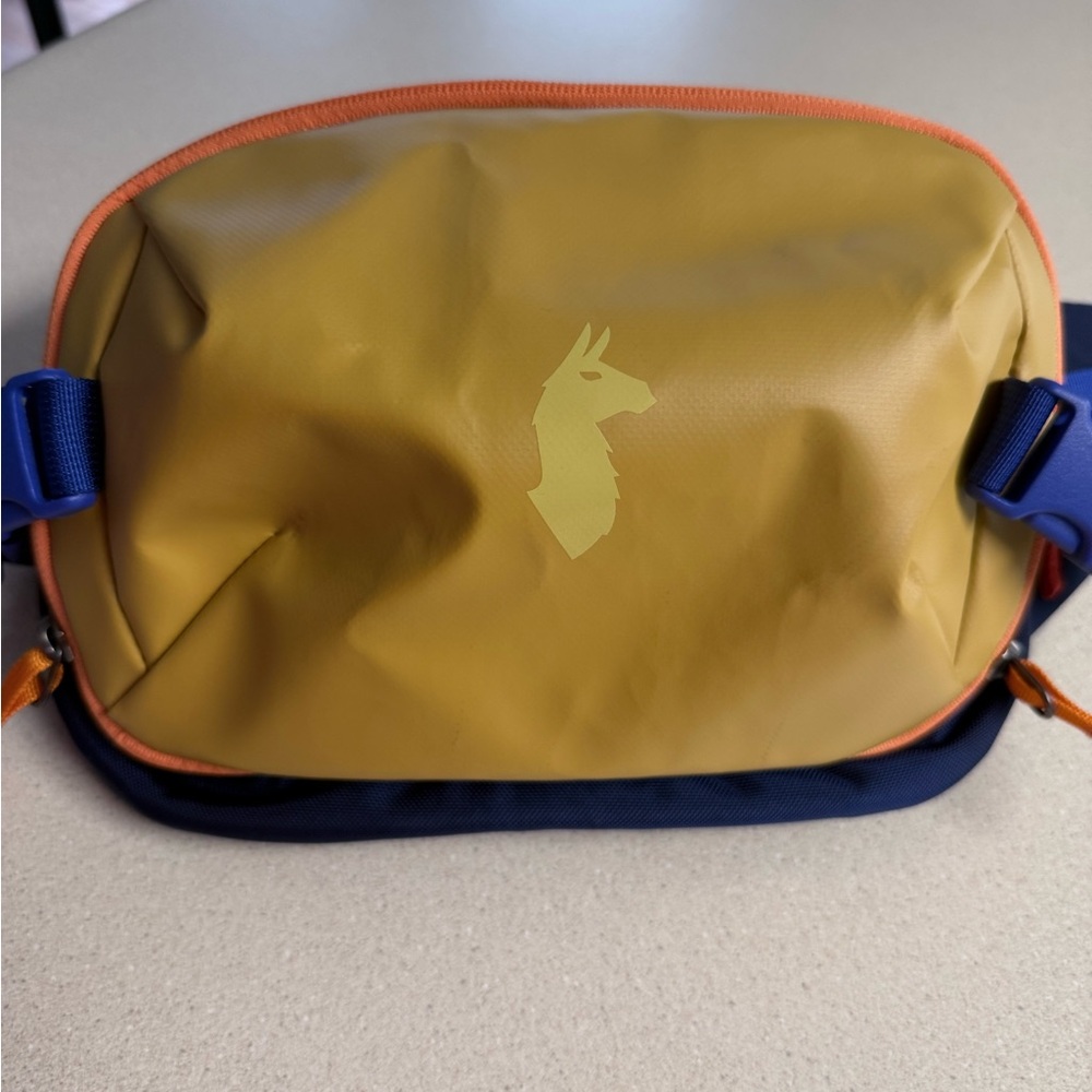 Cotopaxi Tan and Blue Belt Bag with Durable Design